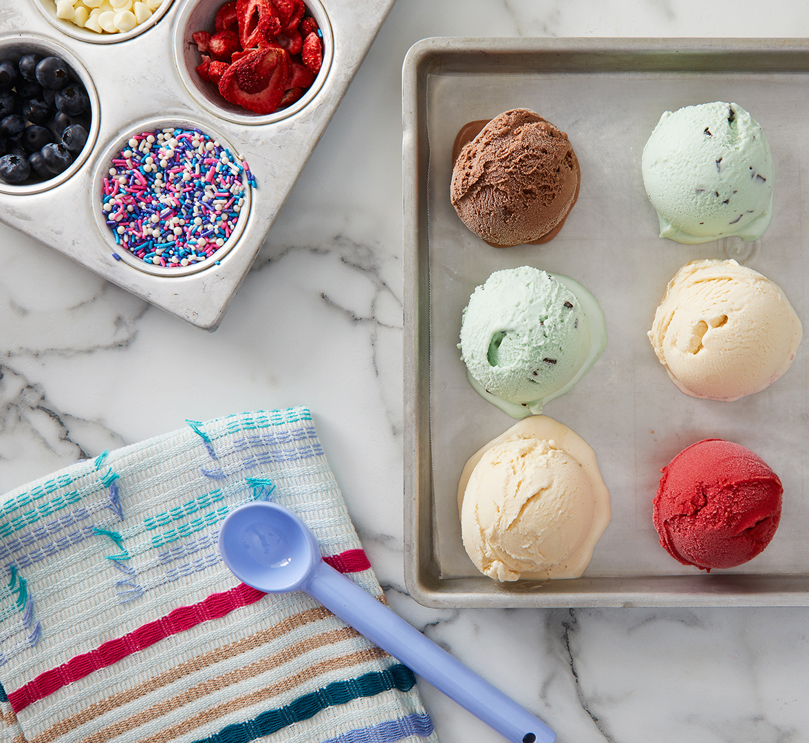 serving ice cream scoops on cold tray