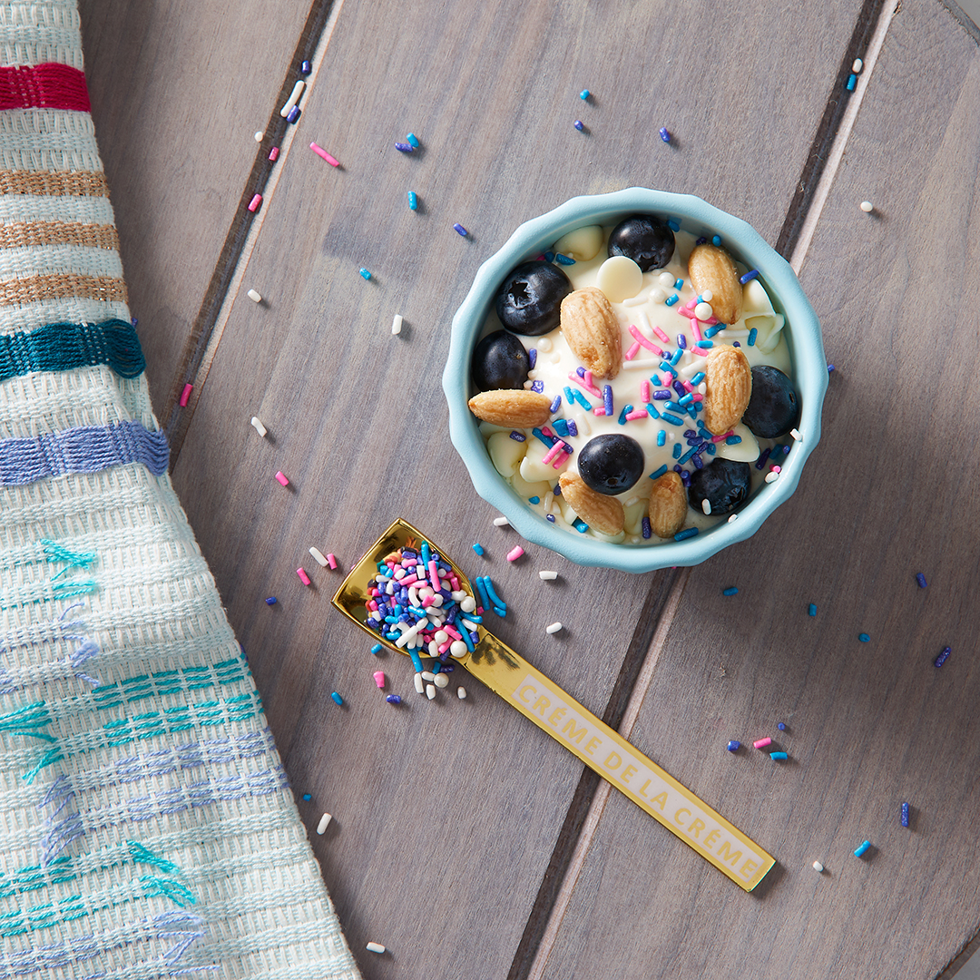 blueberries and sprinkles on ice cream