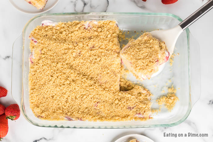 These strawberry crunch bars are easy to make and very delicious! This no bake strawberry crunch bars recipe with cookies is perfect for any occasion. These strawberry cookie bars are simple to make. You are going to love these strawberry crumb bars! #eatingonadime #easydesserts #strawberrydesserts These strawberry crunch bars are easy to make and very delicious! This no bake strawberry crunch bars recipe with cookies is perfect for any occasion. These strawberry cookie bars are simple to make. You are going to love these strawberry crumb bars! #eatingonadime #easydesserts #strawberrydesserts