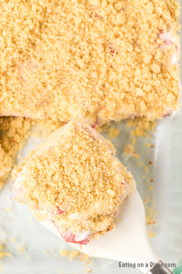 These strawberry crunch bars are easy to make and very delicious! This no bake strawberry crunch bars recipe with cookies is perfect for any occasion. These strawberry cookie bars are simple to make. You are going to love these strawberry crumb bars! #eatingonadime #easydesserts #strawberrydesserts These strawberry crunch bars are easy to make and very delicious! This no bake strawberry crunch bars recipe with cookies is perfect for any occasion. These strawberry cookie bars are simple to make. You are going to love these strawberry crumb bars! #eatingonadime #easydesserts #strawberrydesserts