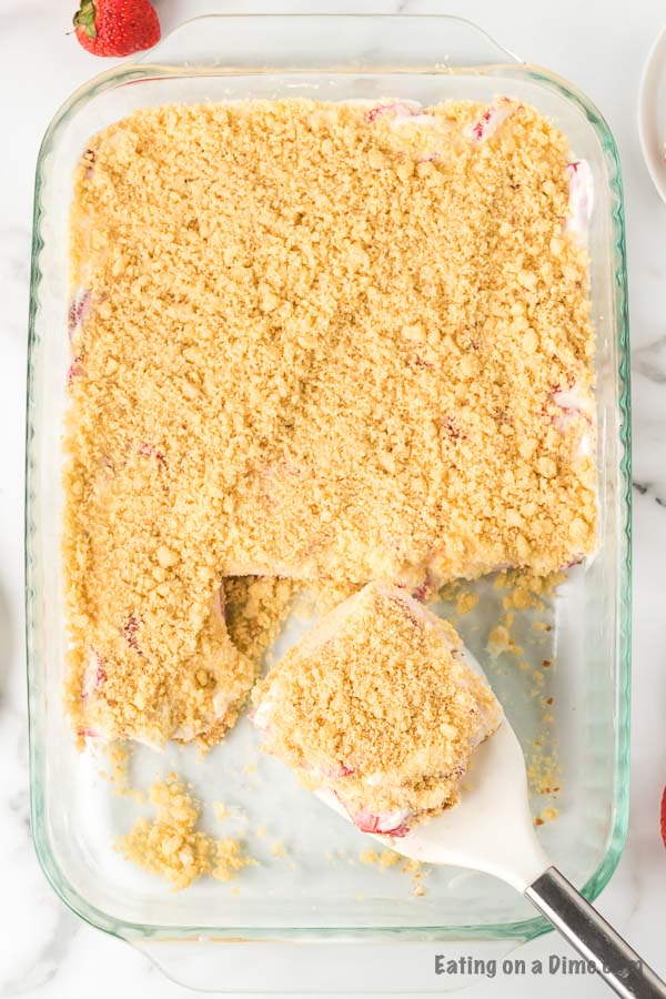 These strawberry crunch bars are easy to make and very delicious! This no bake strawberry crunch bars recipe with cookies is perfect for any occasion. These strawberry cookie bars are simple to make. You are going to love these strawberry crumb bars! #eatingonadime #easydesserts #strawberrydesserts These strawberry crunch bars are easy to make and very delicious! This no bake strawberry crunch bars recipe with cookies is perfect for any occasion. These strawberry cookie bars are simple to make. You are going to love these strawberry crumb bars! #eatingonadime #easydesserts #strawberrydesserts