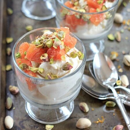 Orange Cardamom Pistachio Ice Cream Sundaes 11 Orange Cardamom Pistachio Ice Cream Sundae is a glass dish with a serving spoon