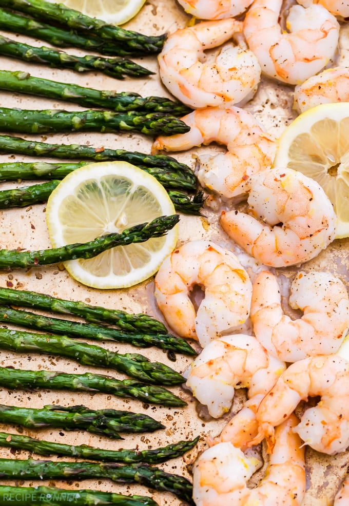 Sheet pan Lemon Roasted Shrimp and Asparagus with Herbed Couscous is one of the easiest dinners I've made and It's full of spring flavors! It can be on the table in 15 minutes or less!