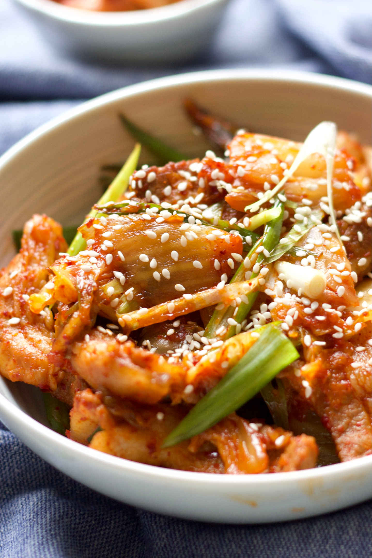 Easy Stir Fry Kimchi & Pork Belly 8 a bowl of stir fry kimchi and pork