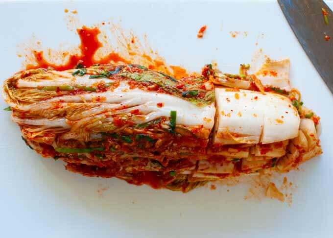 Simple Kimchi Recipe 11 to serve kimchi, cut the marinated Chinese cabbage leaves to 4cm/1½" long crosswise.