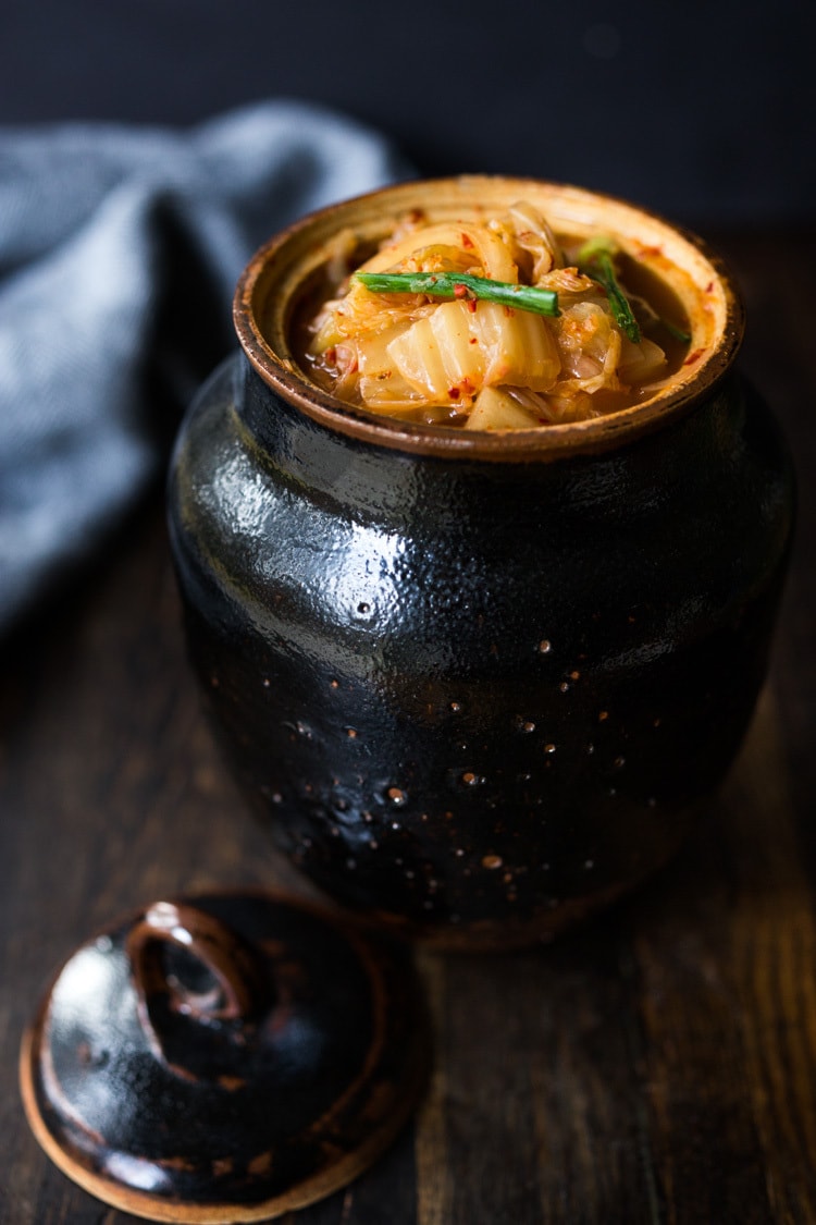 How to make Kimchi that only takes 30 minutes of hands-on-time before mother nature takes over! Full of healthy, gut-healing probiotics, this authentic kimchi recipe is vegan adaptable & gluten free. Quick and easy, make it as spicy or mild as you like. #kimchi #howtomakekimchi #vegan #vegankimchi #eatclean #cleaneating #plantbased #napa cabbage #kimchirecipe #probiotics #fermented #guthealing #fermentedcabbage #koreanfood #koreanrecipe 