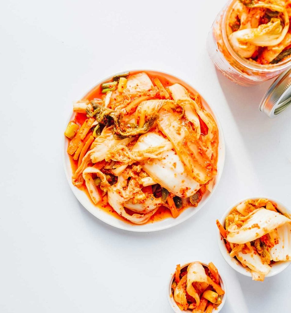 Kimchi 101: How to Make Kimchi (No Fish Sauce) 25 Kimchi on a plate with white background