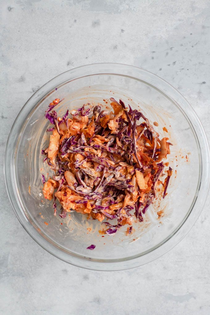 Kimchi Slaw 8 kimchi slaw mixed together in mixing bowl