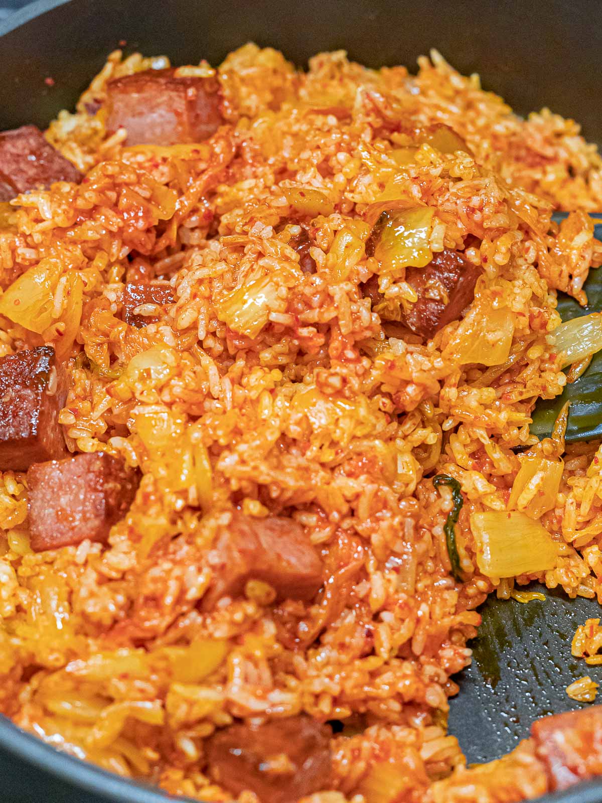 Kimchi Fried Rice with Spam 33 kimchi fried rice with cubes of spam in a pan