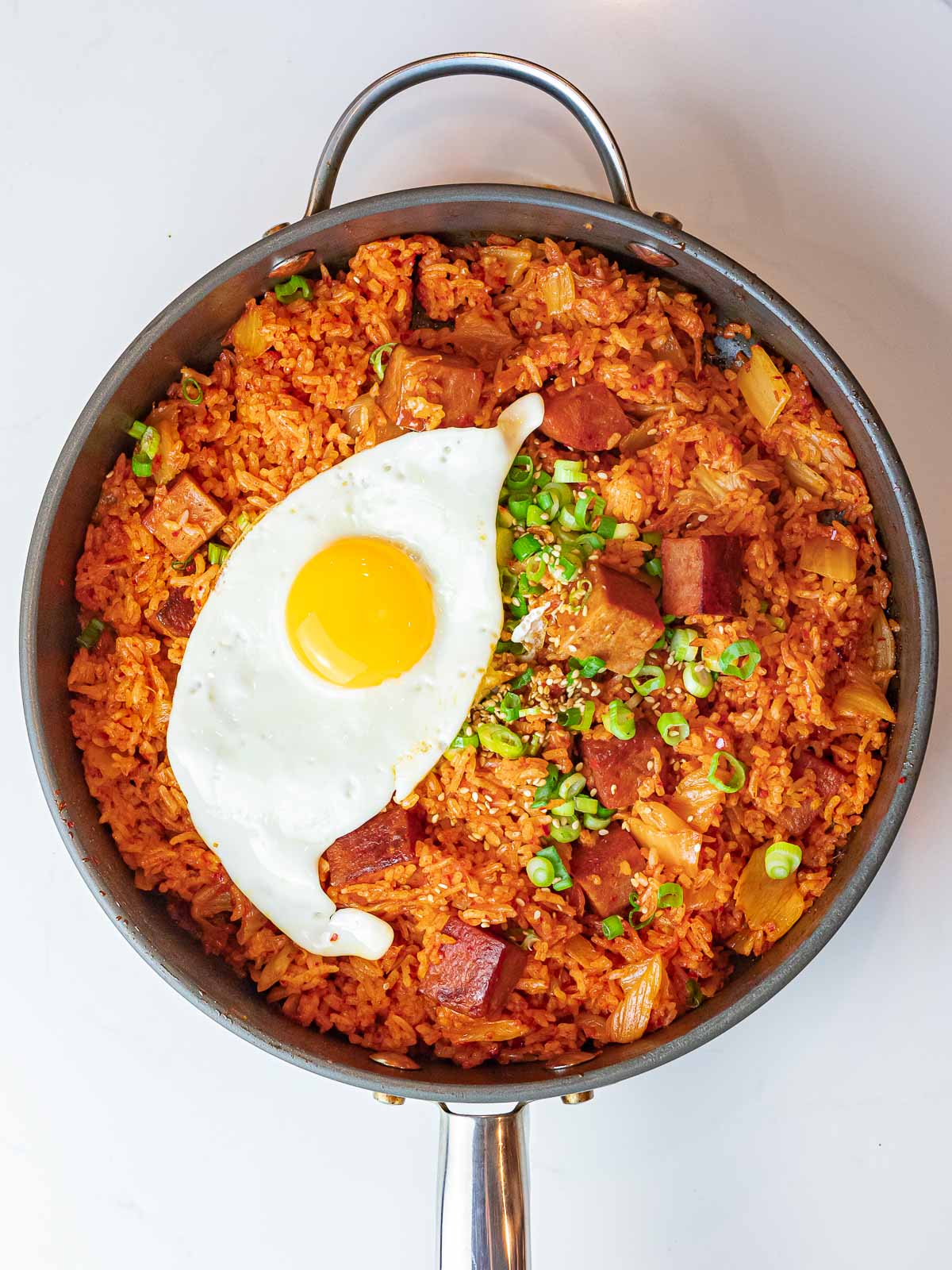 Kimchi Fried Rice with Spam 37 overhead of kimchi spam fried rice and a sunny side up egg with scallions