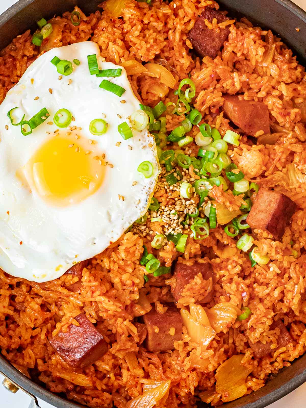 Kimchi Fried Rice with Spam 23 kimchi fried with with spam topped with a fried egg and green onions, kimchi