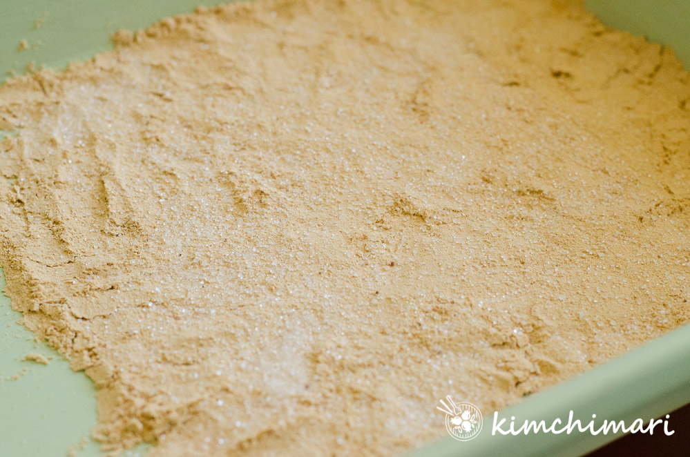 sugar and salt sprinkled soybean powder in pan