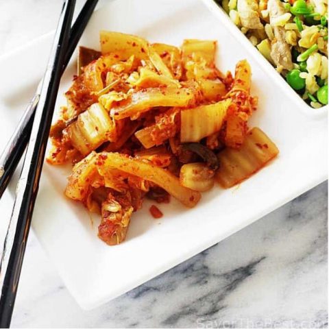 Kimchee an Easy Traditional Recipe (VIDEO) 5 A plate of kimchi with chopsticks and fried rice