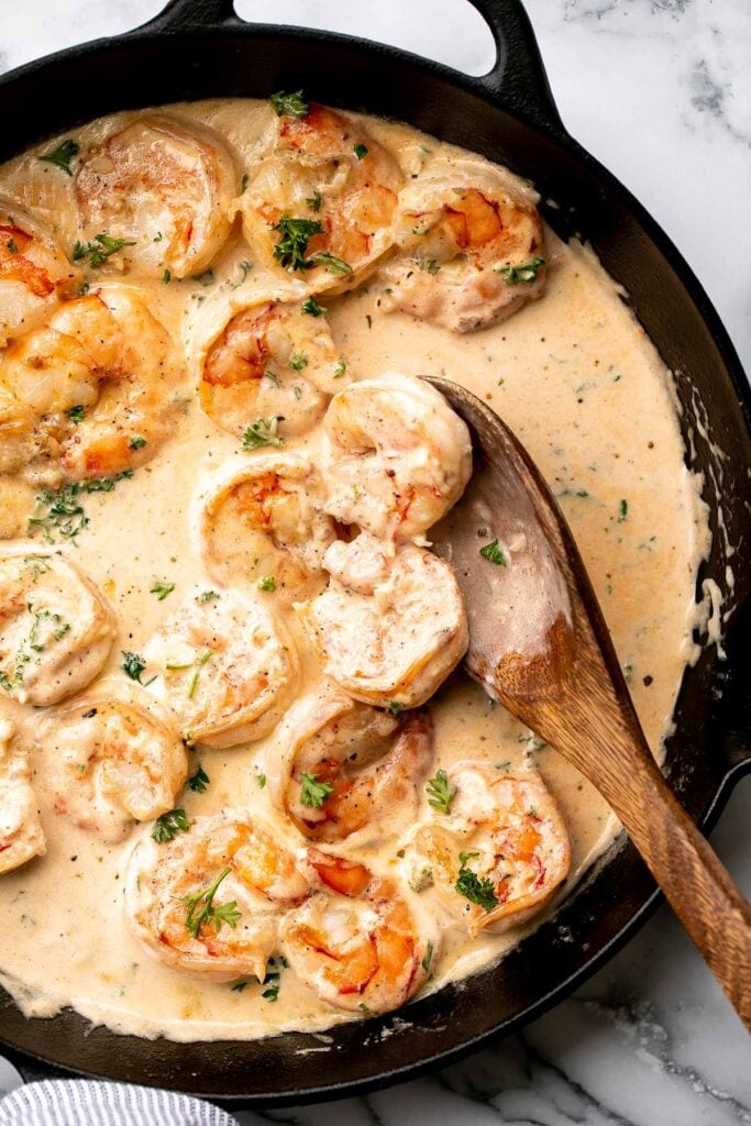 Creamy garlic shrimp is a delicious, quick and easy 15-minute meal (including prep!) that you need to include in your weeknight dinner meal plan. | aheadofthyme.com