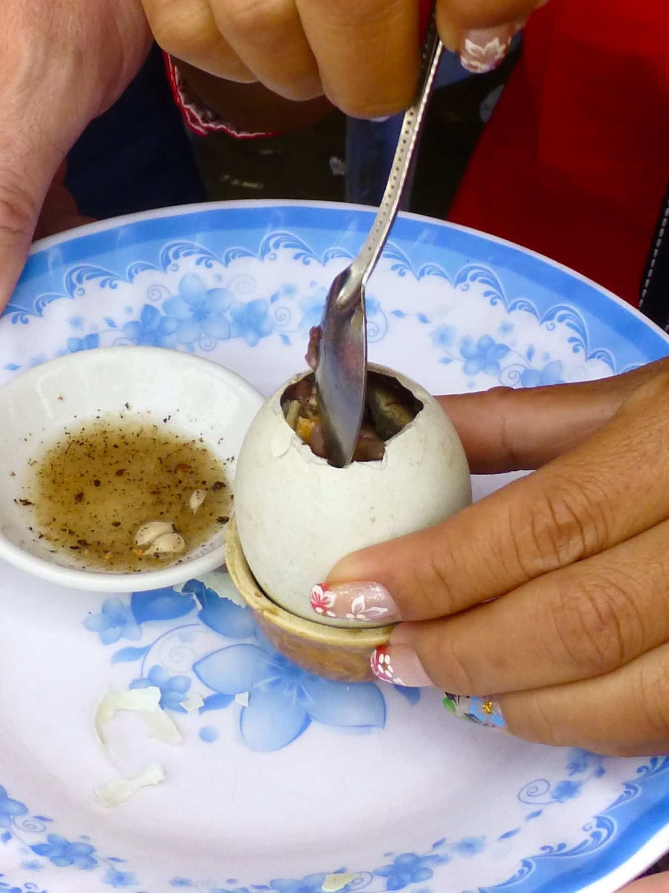 Hello controversy: we tried balut egg at a Cambodian market - Luc & June Travel & Food Blog 12 Balut Egg 2