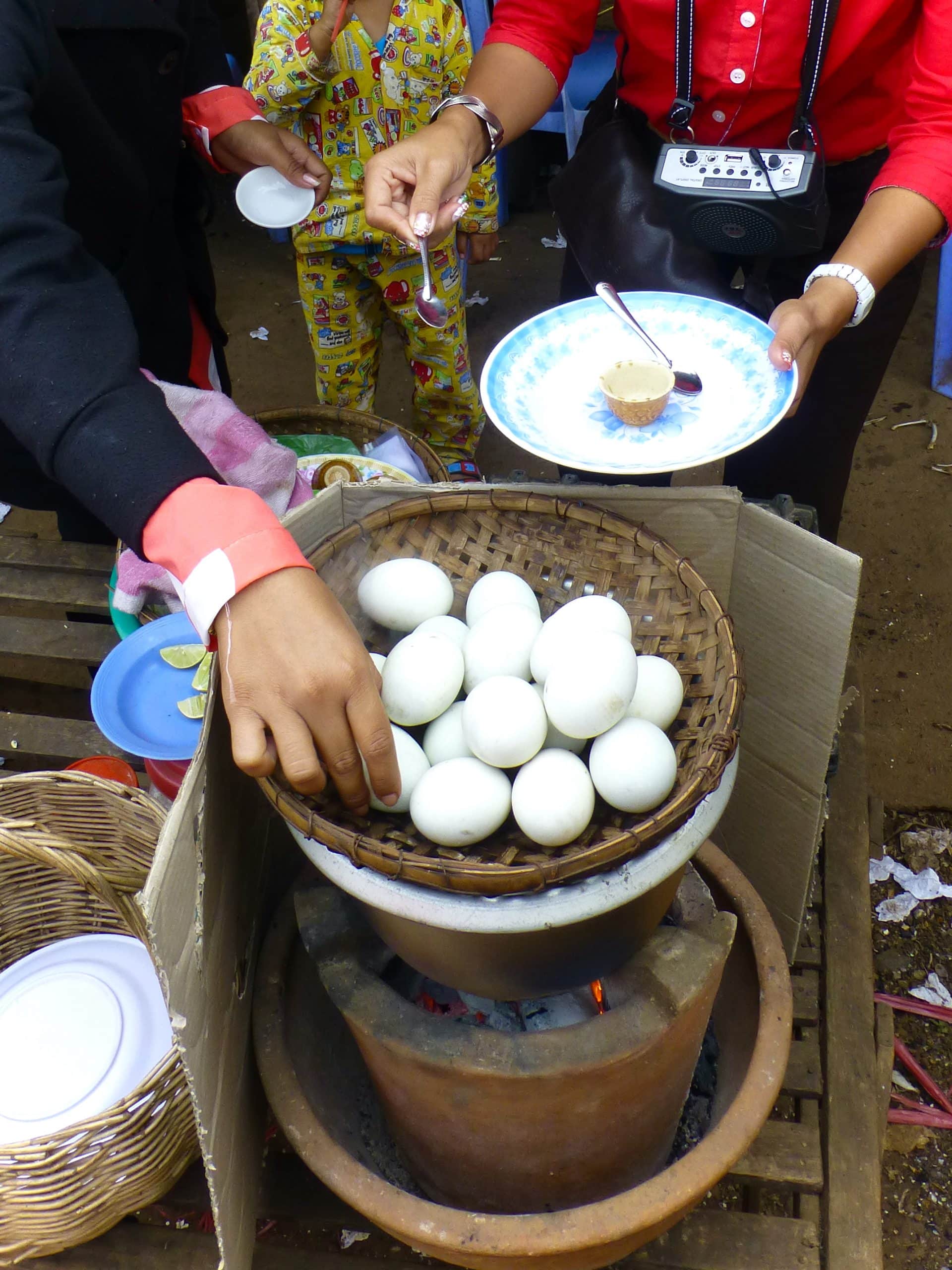 Hello controversy: we tried balut egg at a Cambodian market - Luc & June Travel & Food Blog 8 Balut Egg scaled