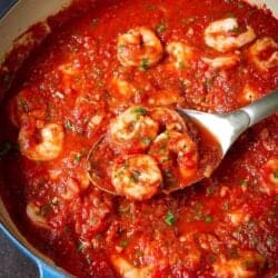 Shrimp in Red Sauce Recipe 19 Shrimp in a homemade tomato sauce, in a blue ceramic skillet.