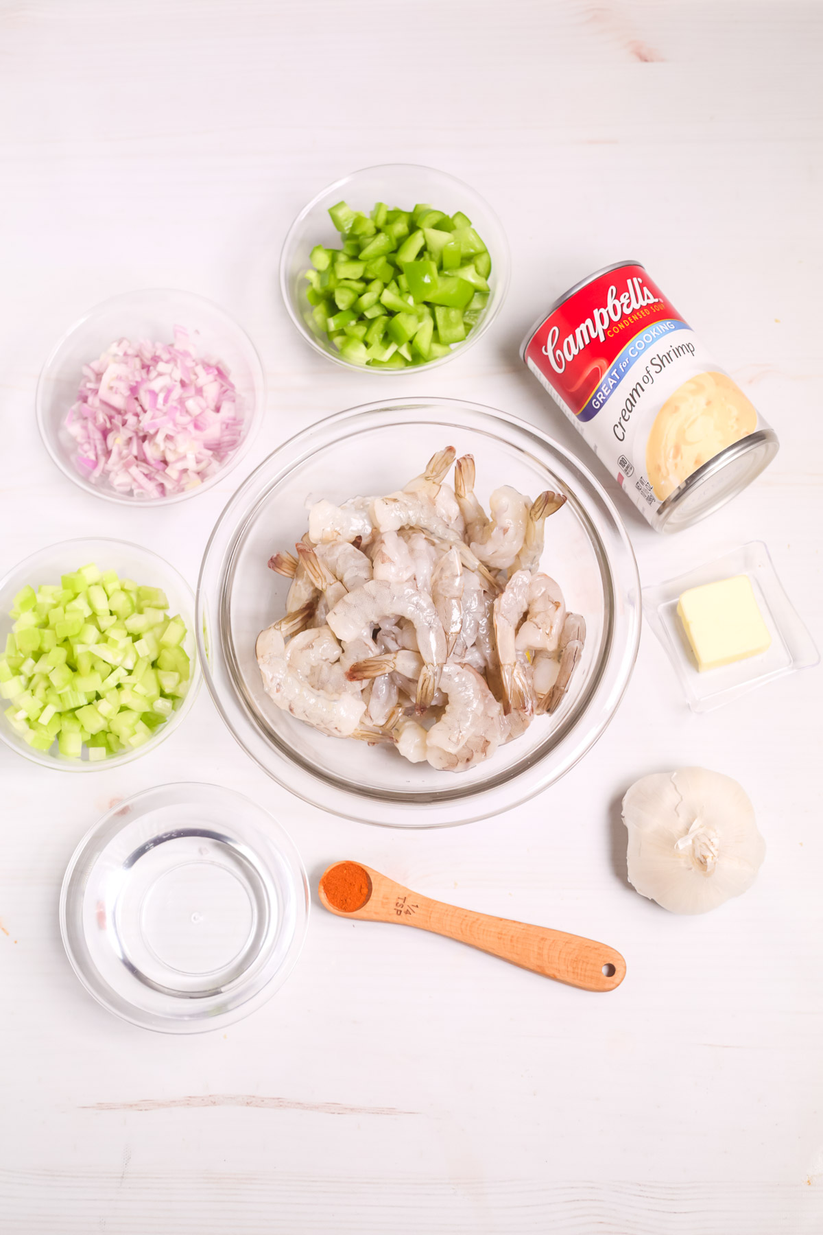 Shrimp, soup mic, onions, celery and ingredients to  make Creamy Garlic Shrimp and Rice.