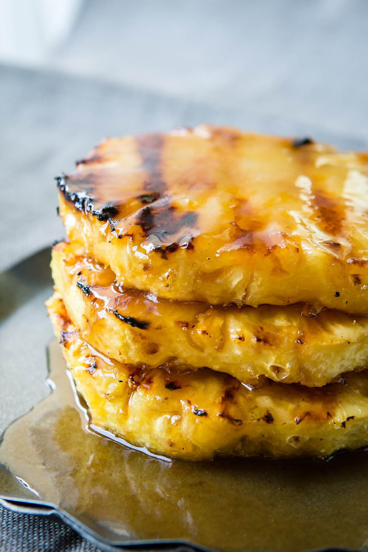 Brown Sugar Grilled Pineapple Sundaes - Oh Sweet Basil 6 Juicy, sweet pineapple with a brown sugar butter sauce that's grilled to perfection. Looking for a healthier dessert? Try our brown sugar grilled pineapple! ohsweetbasil.com